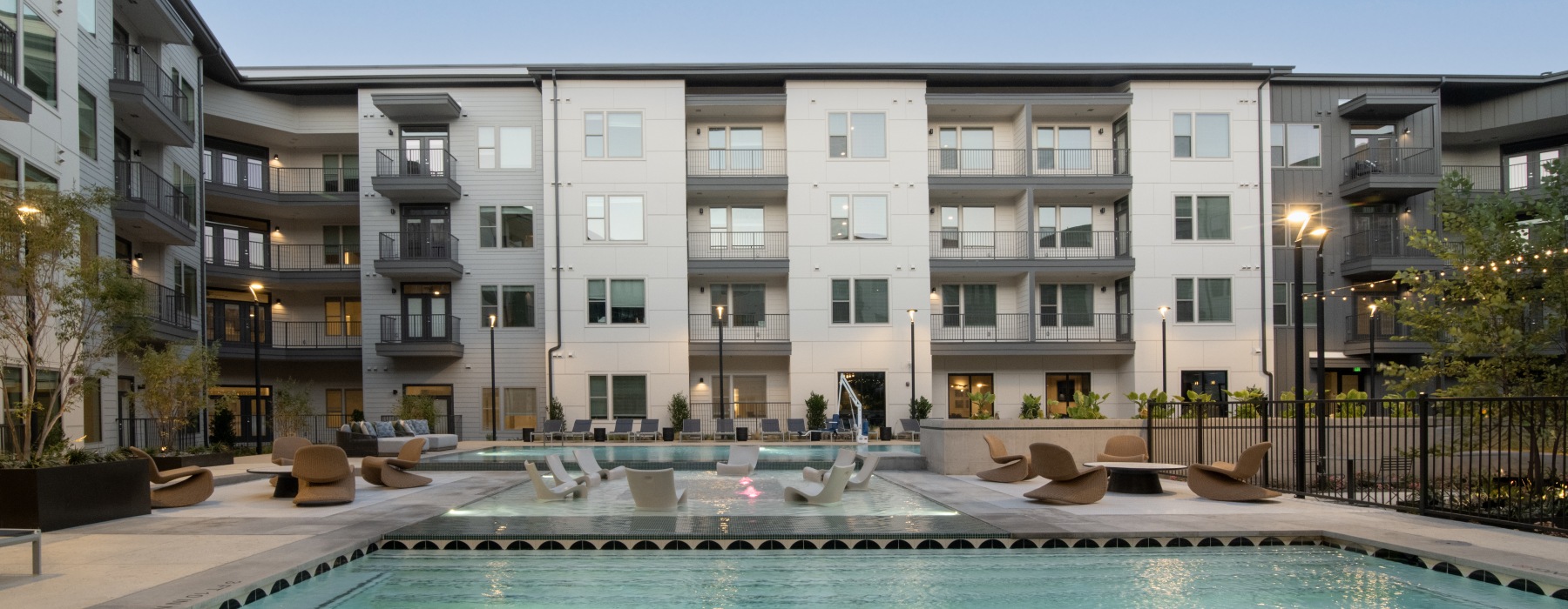 a pool in front of a building