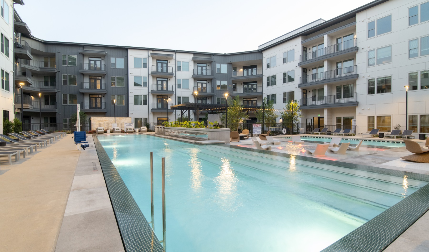 a pool in front of a building