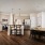 kitchen with bar stools and a table with seating