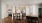 kitchen with bar stools and a table with seating