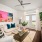 a living room with a rug and a table