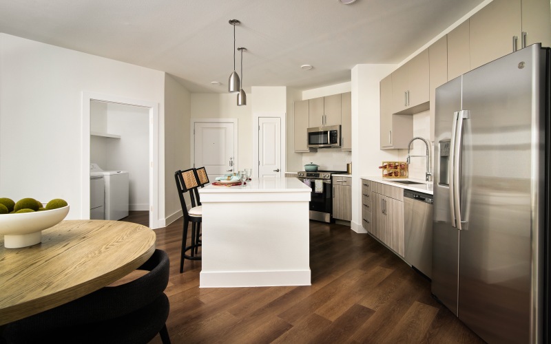 a kitchen with bar stools
