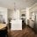a kitchen with bar stools
